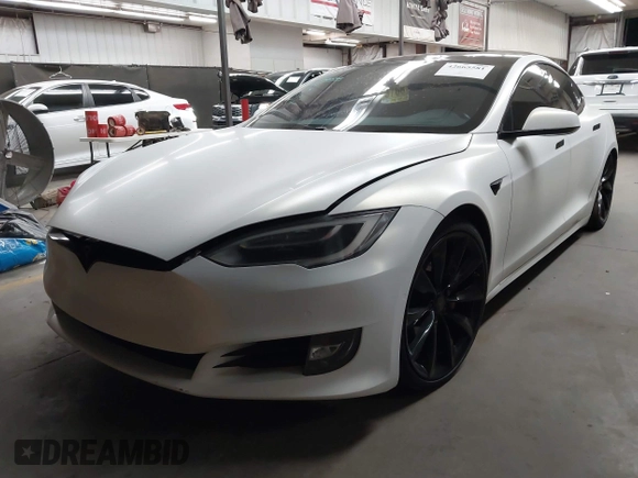 2017 Tesla Model S 100D z VIN 5YJSA1E2XHF224671, wystawiony jako IAAI lot #42665581 z przebiegiem 128 517 mil mil oraz . Historia ofert i sprzedaży dostępna na DreamBid. Obrazek 17.