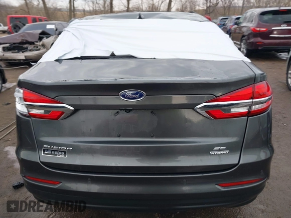 2020 Ford Fusion SE z VIN 3FA6P0LU6LR185721, wystawiony jako IAAI lot #41639827 z przebiegiem 63 857 mil mil oraz . Historia ofert i sprzedaży dostępna na DreamBid. Obrazek 16.