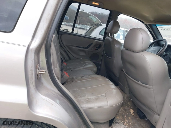 1999 Jeep Grand Cherokee Laredo with VIN 1J4GW58N4XC676836, listed as a IAAI auction lot 41799381 with 203,784 mi miles. Bid and sale history available at carsss.com. Image 8.