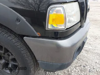 2009 Ford Ranger XLT with VIN 1FTZR45E39PA27500, listed as a IAAI auction lot 41712566 with 232,654 mi miles. Bid and sale history available at carsss.com. Image 19.