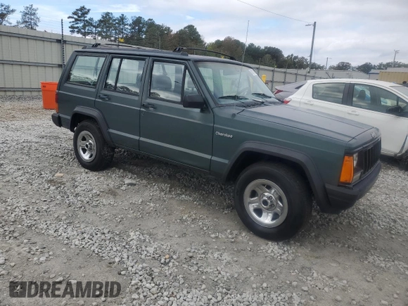1993 Jeep Cherokee Sport with VIN 1J4FT68S4PL588241, listed as a Copart auction lot 80115884 with 204,174 mi miles and Salvage Title. Bid and sale history available at carsss.com. Image 4.