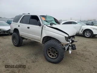 1999 Toyota 4Runner z VIN JT3HM84R3X0034771, wystawiony jako Copart lot #84952924 z przebiegiem 261 449 mil mil oraz Szkoda całkowita • Salvage title. Historia ofert i sprzedaży dostępna na DreamBid. Obrazek 4.