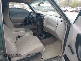 2000 Ford Ranger XL with VIN 1FTYR14VXYTA57062, listed as a IAAI auction lot 42019991 with 191,664 mi miles. Bid and sale history available at carsss.com. Image 5.