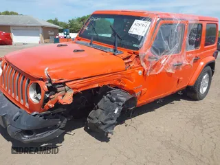 2019 Jeep Wrangler Unlimited Sahara with VIN 1C4HJXEGXKW579982, listed as a IAAI auction lot 42167111 with 98,243 mi miles and . Bid and sale history available at DreamBid. Image 6.
