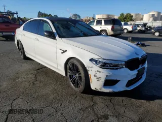 2020 BMW M5 Competition z VIN WBSJF0C02LCE07069, wystawiony jako Copart lot #66175502 z przebiegiem 28 945 mil mil oraz . Historia ofert i sprzedaży dostępna na DreamBid. Obrazek 1.