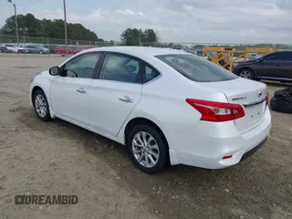 2018 Nissan Sentra S with VIN 3N1AB7AP2JY209169, listed as a IAAI auction lot 41942284 with 123,028 mi miles and . Bid and sale history available at DreamBid. Image 3.