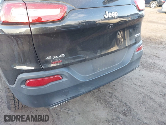 2015 Jeep Cherokee Latitude with VIN 1C4PJMCS0FW745949, listed as a IAAI auction lot 41289847 with 137,440 mi miles and . Bid and sale history available at carsss.com. Image 18.