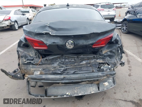2013 Volkswagen CC Sport with VIN WVWBP7AN6DE504679, listed as a IAAI auction lot 42034362 with 148,527 mi miles. Bid and sale history available at carsss.com. Image 17.