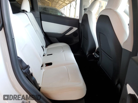 2022 Tesla Model Y Performance z VIN 7SAYGDEF0NF337959, wystawiony jako Copart lot #56871985 z przebiegiem 54 527 mil mil oraz Szkoda całkowita • Salvage title. Historia ofert i sprzedaży dostępna na DreamBid. Obrazek 10.