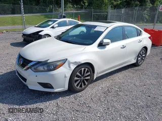 2016 Nissan Altima SR with VIN 1N4AL3APXGC263779, listed as a IAAI auction lot 42356375 with 172,380 mi miles and . Bid and sale history available at DreamBid. Image 2.