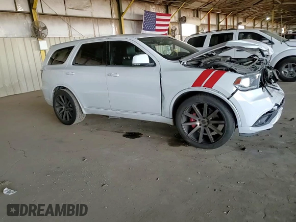 2014 Dodge Durango R/T z VIN 1C4SDJCTXEC345261, wystawiony jako Copart lot #52190285 z przebiegiem 172 035 mil mil oraz Szkoda całkowita • Salvage title. Historia ofert i sprzedaży dostępna na DreamBid. Obrazek 11.