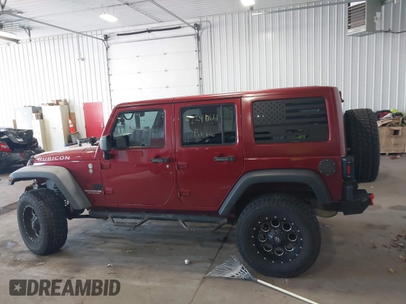 2011 Jeep Wrangler Unlimited Rubicon with VIN 1J4BA6H18BL584486, listed as a IAAI auction lot 42340661 with 152,896 mi miles and . Bid and sale history available at DreamBid. Image 14.