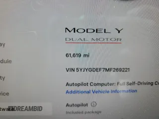 2021 Tesla Model Y Performance with VIN 5YJYGDEF7MF269221, listed as a Copart auction lot 52109785 with 61,619 mi miles and Salvage Title. Bid and sale history available at DreamBid. Image 9.
