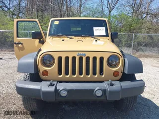 2013 Jeep Wrangler Sport with VIN 1C4AJWAG8DL676619, listed as a IAAI auction lot 41942627 with 130,306 mi miles. Bid and sale history available at carsss.com. Image 13.
