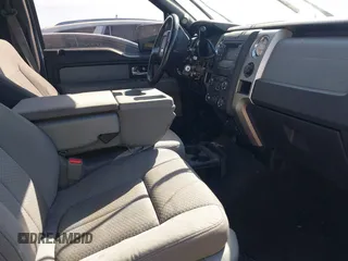 2014 Ford F-150 XL with VIN 1FTFW1EF1EFC93570, listed as a IAAI auction lot 41652787 with 265,015 mi miles. Bid and sale history available at carsss.com. Image 5.