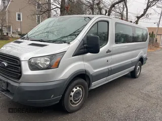 2015 Ford Transit Passenger XL with VIN 1FBZX2YGXFKA96110, listed as a Copart auction lot 84711064 with 169,835 mi miles and Clean Title. Bid and sale history available at DreamBid. Image 2.