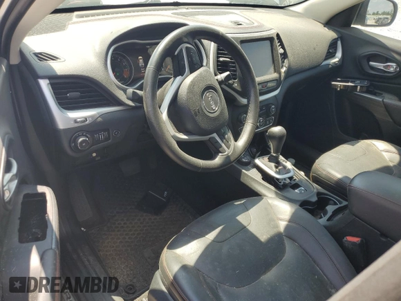 2015 Jeep Cherokee Trailhawk with VIN 1C4PJMBS3FW735398, listed as a Copart auction lot 63700015 with 157,123 mi miles and Clean title. Bid and sale history available at DreamBid. Image 8.