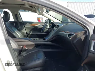 2014 Lincoln MKZ with VIN 3LN6L2GKXER817659, listed as a IAAI auction lot 40896691 with 84,164 mi miles and . Bid and sale history available at DreamBid. Image 5.