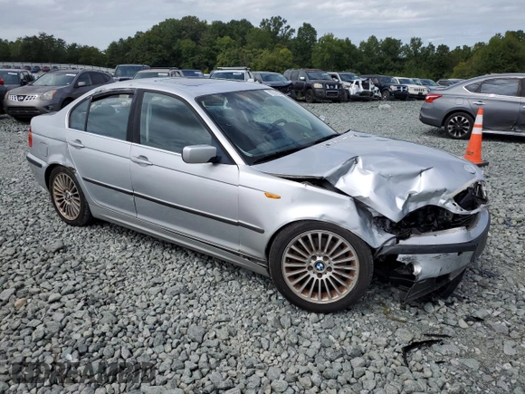 2003 BMW 3 Series 330i with VIN WBAEV53423KM30265, listed as a Copart auction lot 70214374 with 152,171 mi miles and Salvage Title. Bid and sale history available at carsss.com. Image 4.
