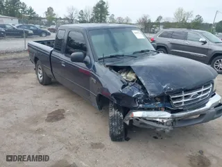 2003 Ford Ranger XL with VIN 1FTYR14V23PB28448, listed as a IAAI auction lot 41935724 with 297,326 mi miles. Bid and sale history available at carsss.com. Image 10.