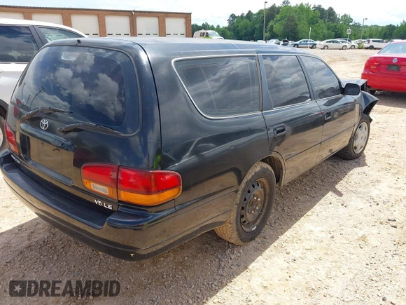 1996 Toyota Camry LE z VIN 4T1EF12K9TU117514, wystawiony jako IAAI lot #42241880 z przebiegiem 192 764 mil mil oraz . Historia ofert i sprzedaży dostępna na DreamBid. Obrazek 4.