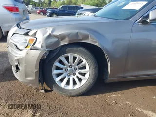 2014 Chrysler 300 with VIN 2C3CCAAG4EH159911, listed as a IAAI auction lot 41963042 with 105,972 mi miles and . Bid and sale history available at DreamBid. Image 6.