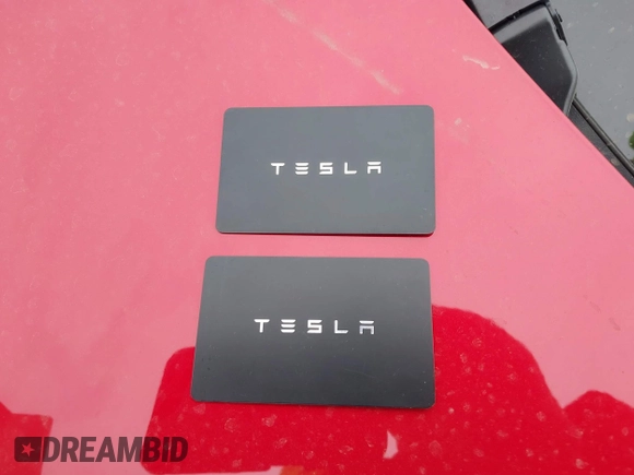 2022 Tesla Model 3 Performance with VIN 5YJ3E1ECXNF329188, listed as a IAAI auction lot 41308371 with 15,220 mi miles and . Bid and sale history available at DreamBid. Image 11.