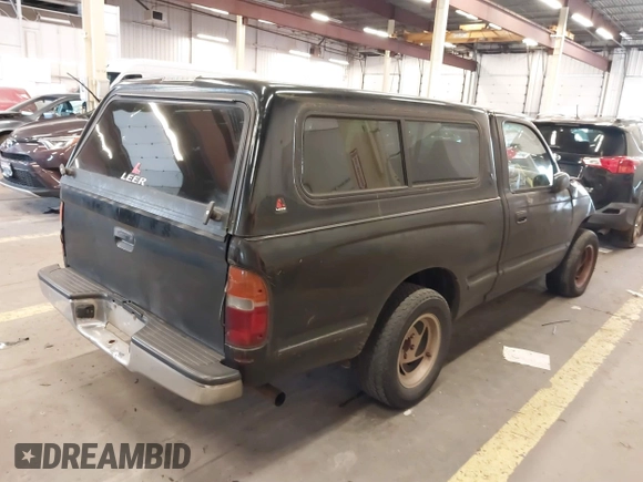 1998 Toyota Tacoma with VIN 4TANL42N4WZ030101, listed as a IAAI auction lot 41735767 with 247,387 mi miles. Bid and sale history available at carsss.com. Image 4.