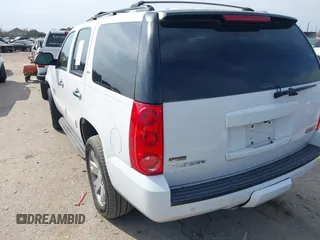 2011 GMC Yukon SLT with VIN 1GKS1CE03BR347941, listed as a IAAI auction lot 41637343 with 198,830 mi miles. Bid and sale history available at carsss.com. Image 3.