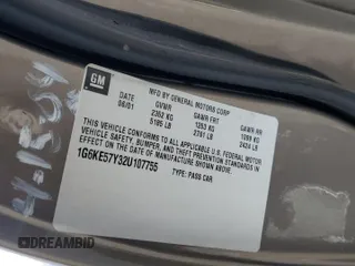 2002 Cadillac DeVille DHS z VIN 1G6KE57Y32U107755, wystawiony jako Copart lot #52811235 z przebiegiem 111 141 mil mil oraz Nie do naprawy. Historia ofert i sprzedaży dostępna na DreamBid. Obrazek 12.
