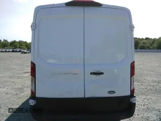 2023 Ford Transit Cargo with VIN 1FTBR1C87PKC01057, listed as a Copart auction lot 66183374 with 1,863 mi miles and Salvage Title. Bid and sale history available at DreamBid. Image 6.