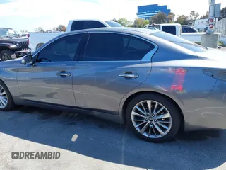 2021 Infiniti Q50 Luxe with VIN JN1EV7BP8MM707259, listed as a IAAI auction lot 41901696 with 78,060 mi miles and . Bid and sale history available at DreamBid. Image 13.