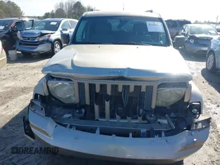 2011 Jeep Liberty Sport Jet with VIN 1J4PN2GK8BW529905, listed as a IAAI auction lot 41600214 with 169,199 mi miles and . Bid and sale history available at carsss.com. Image 6.