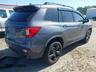 2019 Honda Passport Elite with VIN 5FNYF8H04KB004657, listed as a IAAI auction lot 41993974 with 90,964 mi miles and . Bid and sale history available at DreamBid. Image 4.