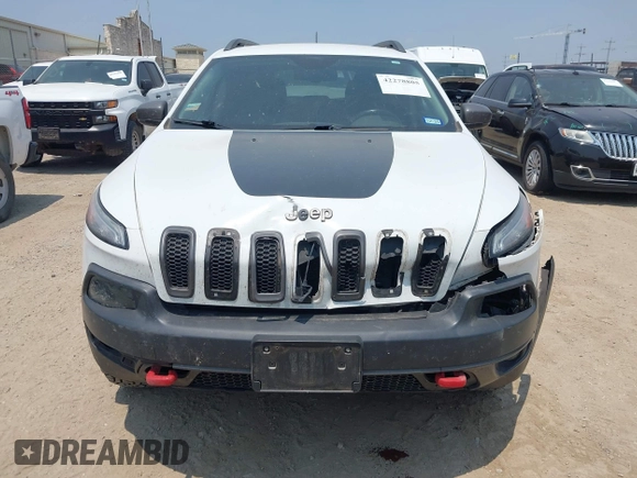 2015 Jeep Cherokee Trailhawk z VIN 1C4PJMBS5FW574102, wystawiony jako IAAI lot #42278805 z przebiegiem 164 250 mil mil oraz . Historia ofert i sprzedaży dostępna na DreamBid. Obrazek 13.