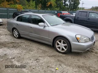2002 Infiniti Q45 z VIN JNKBF01A52M002920, wystawiony jako Copart lot #73249364 z przebiegiem 95 955 mil mil oraz Tytuł czysty. Historia ofert i sprzedaży dostępna na DreamBid. Obrazek 4.