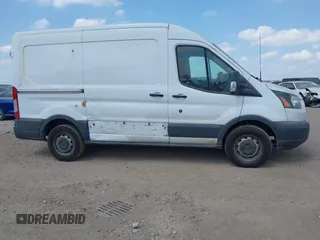 2018 Ford Transit with VIN 1FTYR1CM1JKA69797, listed as a IAAI auction lot 42282537 with 184,498 mi miles and . Bid and sale history available at DreamBid. Image 13.