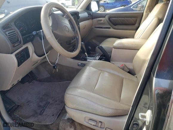 2000 Toyota Land Cruiser with VIN JT3HT05J3Y0088425, listed as a Copart auction lot 41387034 with 243,408 mi miles and Salvage Title. Bid and sale history available at carsss.com. Image 7.