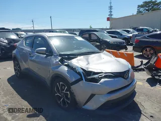 2019 Toyota C-HR XLE z VIN NMTKHMBX3KR100868, wystawiony jako IAAI lot #42036999 z przebiegiem 23 534 mil mil oraz . Historia ofert i sprzedaży dostępna na DreamBid. Obrazek 1.