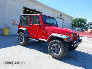 1999 Jeep Wrangler Sport with VIN 1J4FY19S0XP468304, listed as a IAAI auction lot 40038580 with 123,247 mi miles. Bid and sale history available at carsss.com. Image 1.