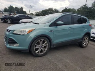 2013 Ford Escape SE z VIN 1FMCU0GXXDUA85802, wystawiony jako Copart lot #64477485 z przebiegiem 138 734 mil mil oraz Szkoda całkowita • Salvage title. Historia ofert i sprzedaży dostępna na DreamBid. Obrazek 1.