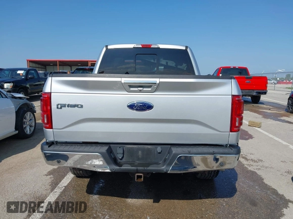 2015 Ford F-150 XLT with VIN 1FTEW1EG8FKE61864, listed as a IAAI auction lot 42120436 with 129,448 mi miles and . Bid and sale history available at DreamBid. Image 17.