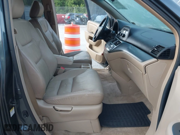 2005 Honda Odyssey EX-L with VIN 5FNRL38605B406281, listed as a IAAI auction lot 42582488 with 185,862 mi miles and . Bid and sale history available at DreamBid. Image 5.