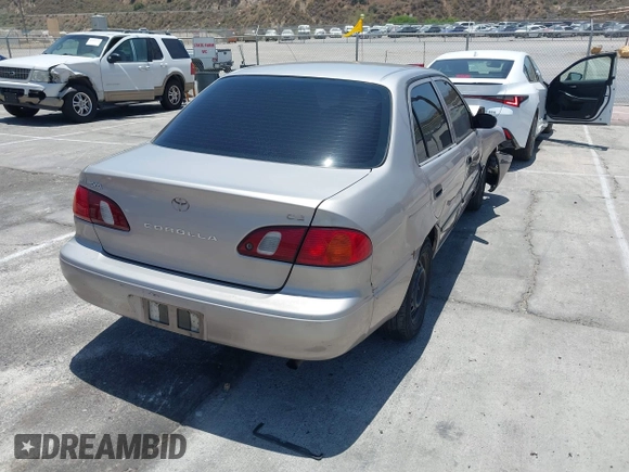 2000 Toyota Corolla VE with VIN 1NXBR12E5YZ369711, listed as a IAAI auction lot 42550174 with 273,785 mi miles and . Bid and sale history available at DreamBid. Image 4.