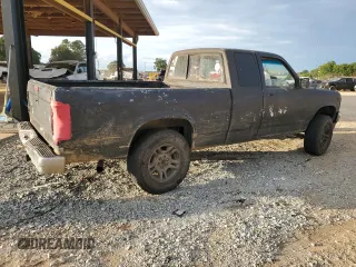1995 Dodge Dakota z VIN 1B7GG23Y1SS183049, wystawiony jako Copart lot #72961204 z przebiegiem 406 345 mil mil oraz Czysty tytuł • Clean title. Historia ofert i sprzedaży dostępna na DreamBid. Obrazek 3.