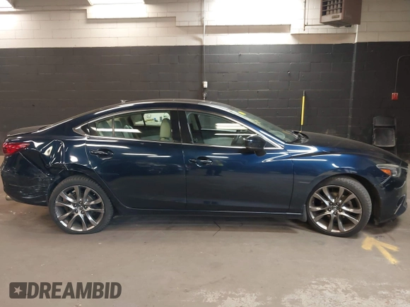 2017 Mazda 6 Grand Touring with VIN JM1GL1W51H1101519, listed as a IAAI auction lot 42132215 with 145,796 mi miles. Bid and sale history available at carsss.com. Image 13.