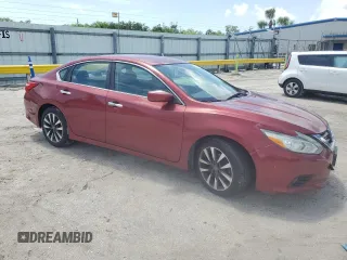 2017 Nissan Altima SV with VIN 1N4AL3AP4HC153800, listed as a Copart auction lot 60623345 with 129,857 mi miles and Salvage title. Bid and sale history available at DreamBid. Image 4.