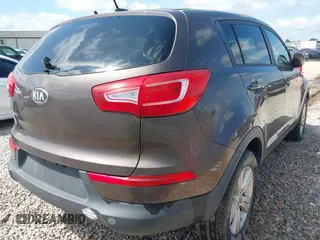 2013 Kia Sportage LX with VIN KNDPB3A24D7416706, listed as a IAAI auction lot 42525729 with 166,798 mi miles and . Bid and sale history available at DreamBid. Image 4.