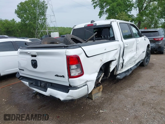 2020 Ram 1500 Big Horn with VIN 1C6SRFFT8LN301178, listed as a IAAI auction lot 42265449 with 74,968 mi miles and . Bid and sale history available at DreamBid. Image 4.