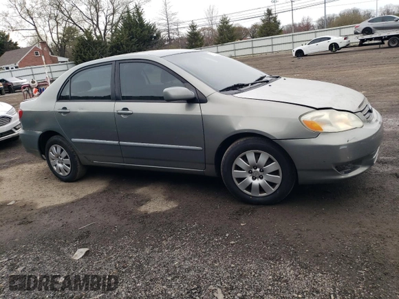 2003 Toyota Corolla CE with VIN 2T1BR32EX3C002101, listed as a Copart auction lot 51678735 with 168,201 mi miles and Salvage Title. Bid and sale history available at DreamBid. Image 4.